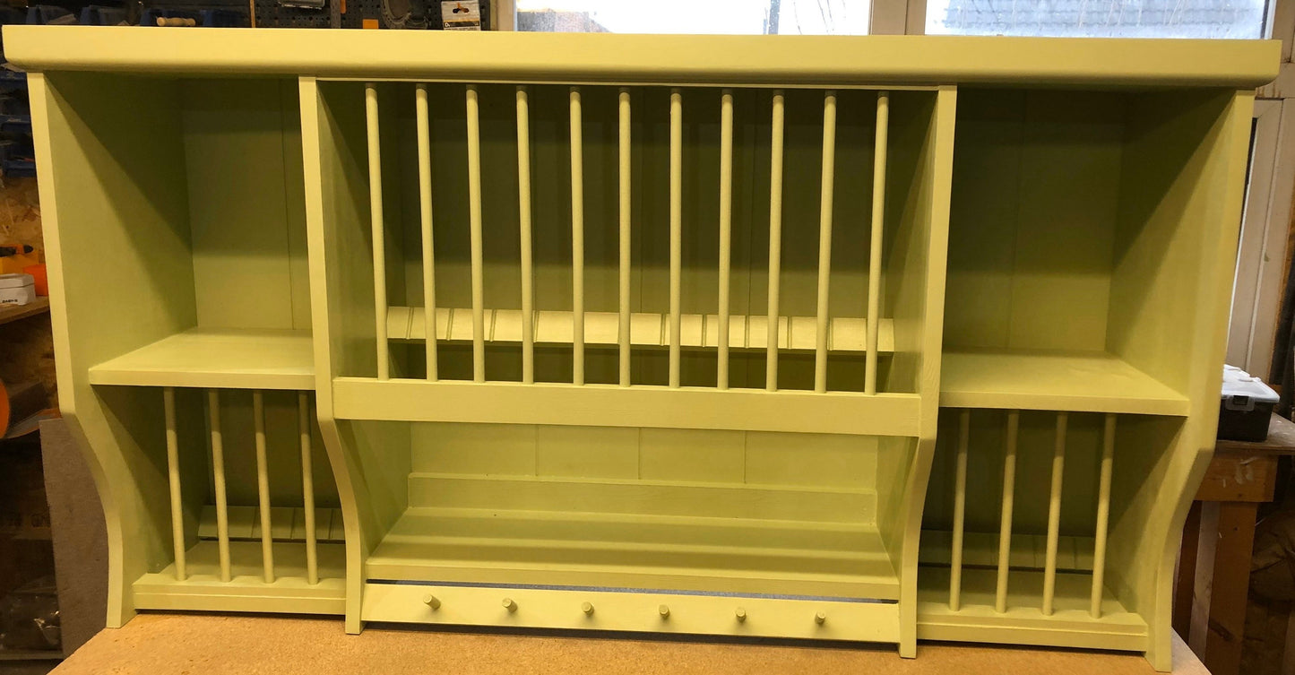 The foolow handmade plate rack storage