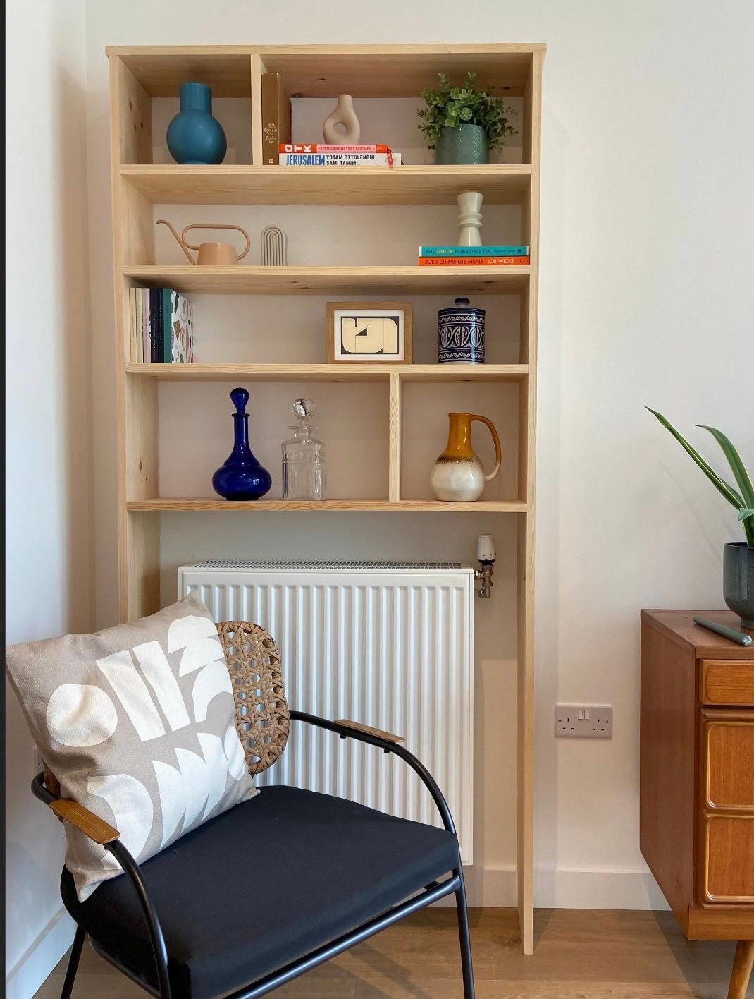 The Stacy stained over radiator bookcase deposit available