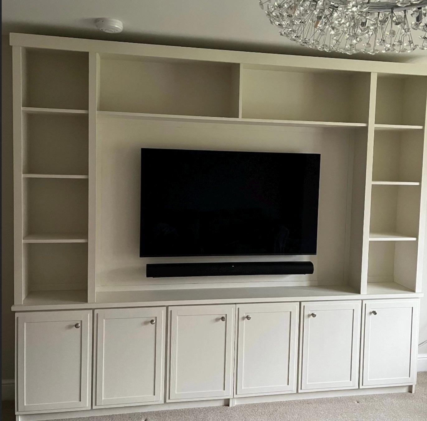 All tv PS4 Xbox dvd sound bar cables hidden behind the back panel